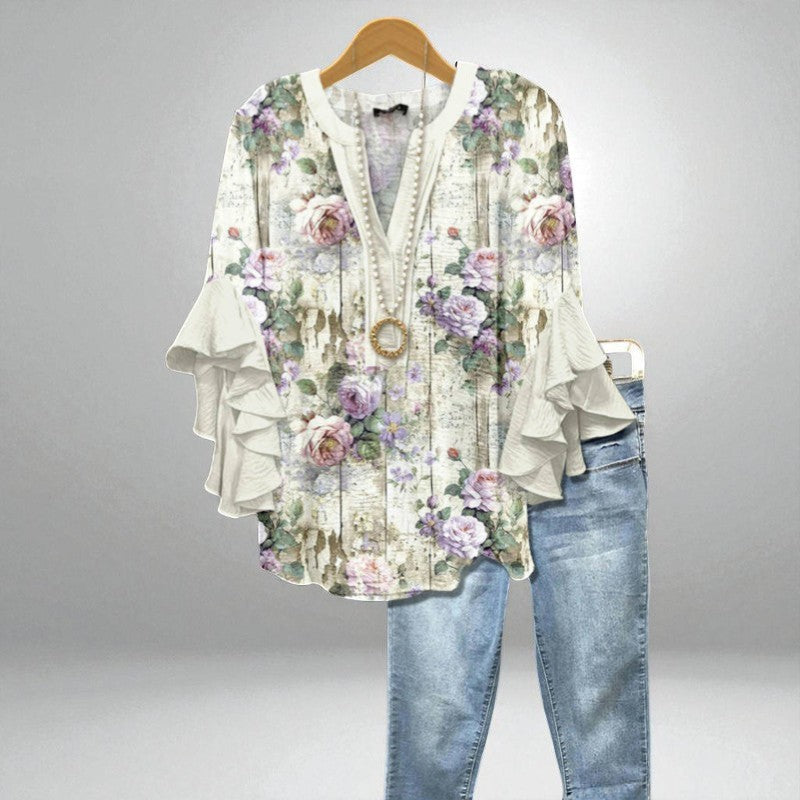 Fleur – Romantyczna bluzka z kwiatowym nadrukiem i szerokimi rękawami